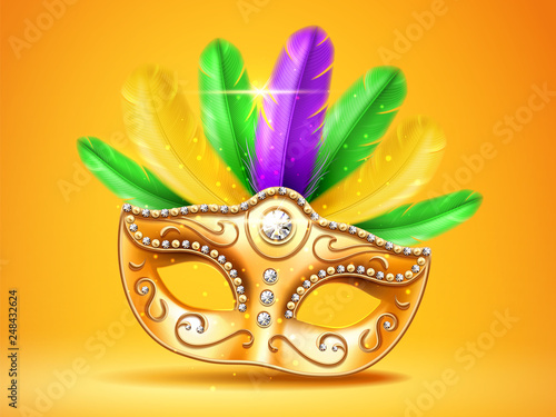 Colorful feather masquerade mask with diamonds. Carnival or party, festival celebration golden face cover. Part of theater costume. Colombina masque design for mardi gras festive. Celebration theme
