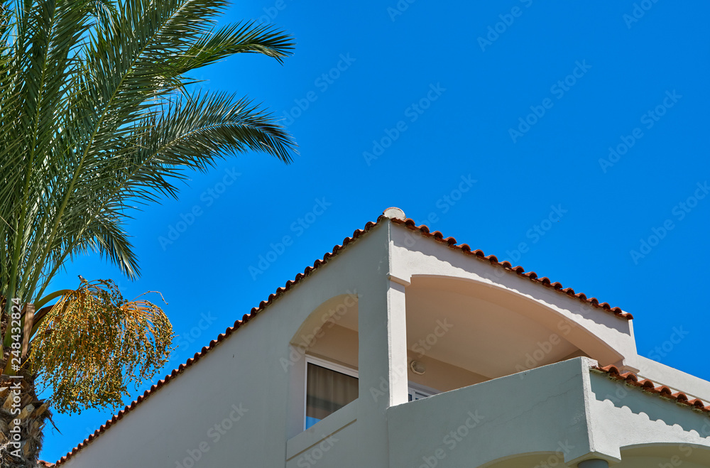 Fototapeta premium Hotel building with balcony on the sea