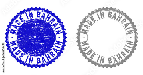 Grunge MADE IN BAHRAIN stamp seals isolated on a white background. Rosette seals with grunge texture in blue and gray colors. Vector rubber overlay of MADE IN BAHRAIN text inside round rosette.