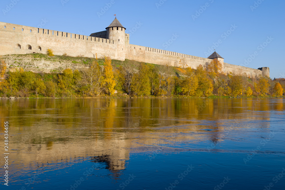 Golden autumn at the walls of the Ivangorod fortress. Russia
