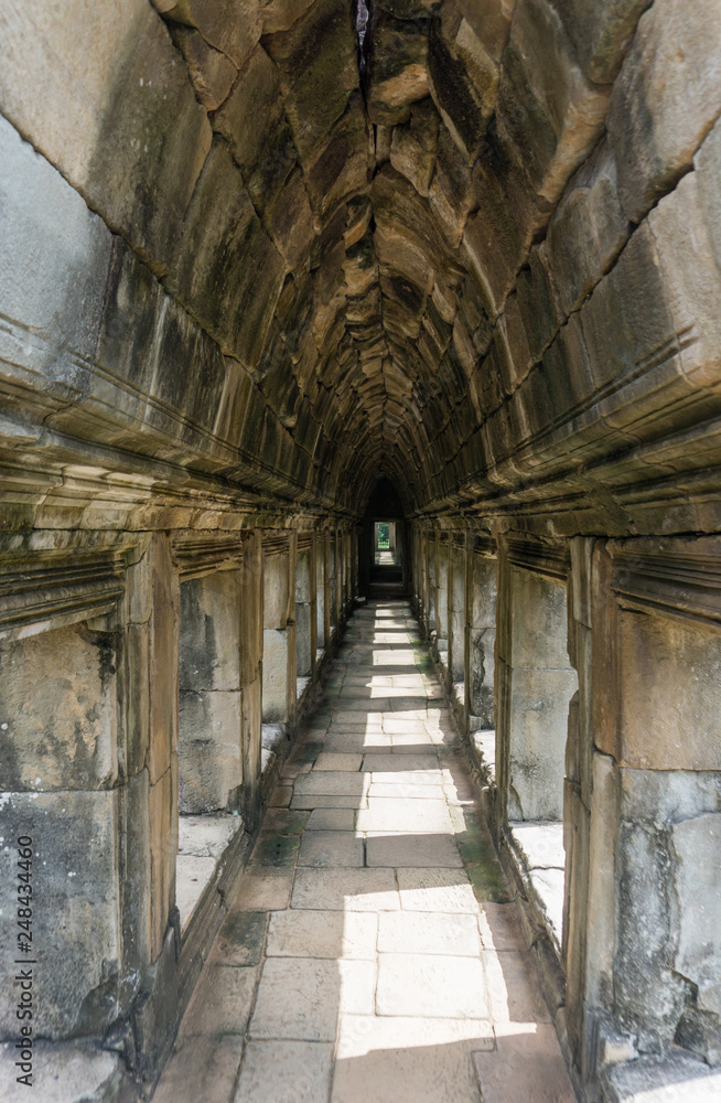 Stone passageway at the Baphuon temple inside the Angkor temple complex in Cambodia Stone passageway at the Baphuon temple inside the Angkor temple complex in Cambodia