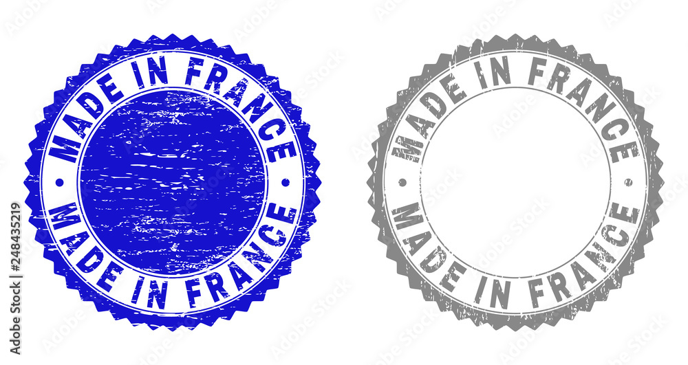 Grunge MADE IN FRANCE stamp seals isolated on a white background. Rosette seals with grunge texture in blue and gray colors. Vector rubber stamp imprint of MADE IN FRANCE caption inside round rosette.