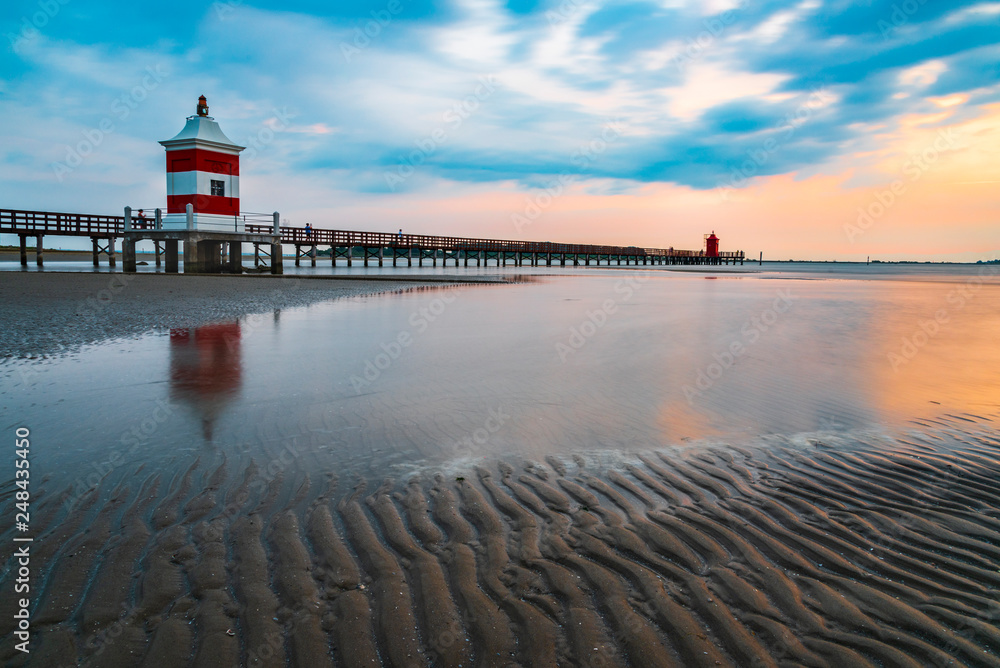 When the sun is born. Sunrise at the lighthouse of Lignano Sabbiadoro. When the sun is born. Sunrise at the lighthouse of Lignano Sabbiadoro.