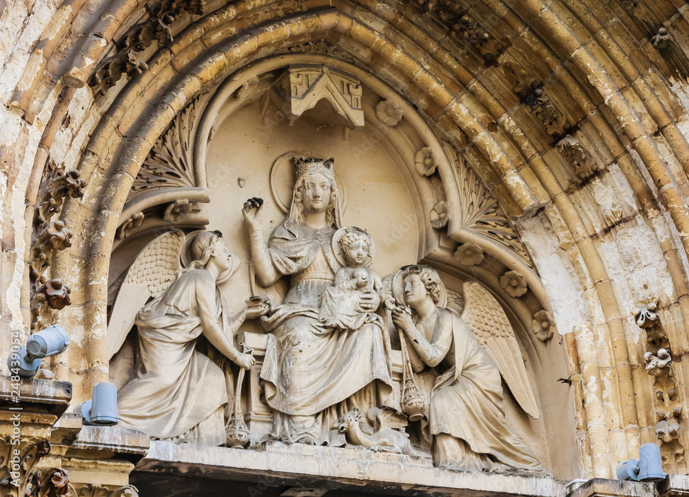  Madonna with Child flanked with angels, tympanum of St Severin Church in Paris