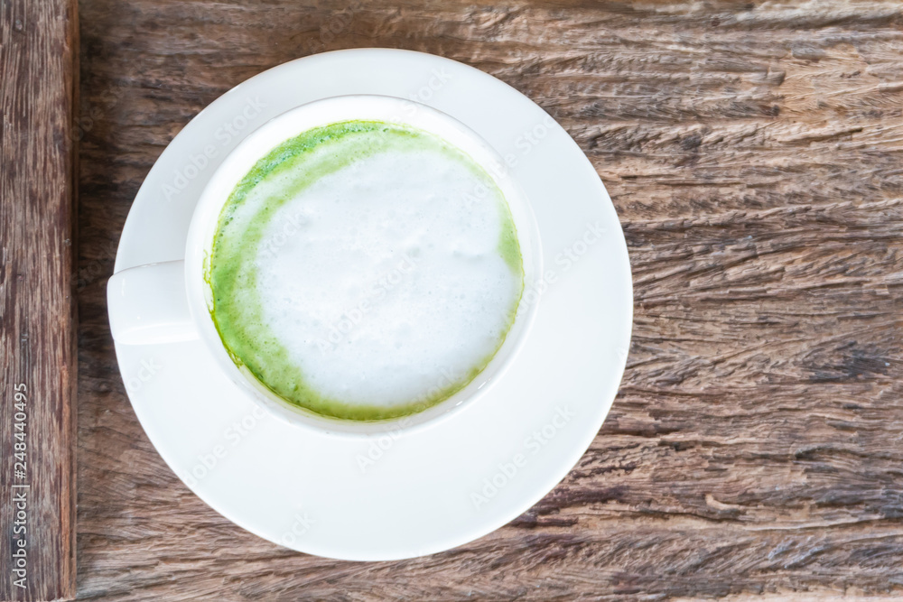 hot Matcha green tea latte beverage in table hot Matcha green tea latte beverage in table