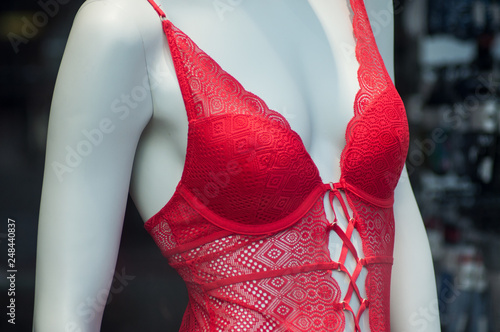closeup of red underwear on mannequin in fashion store showroom for women