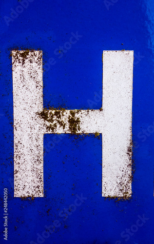 Written Wording in Distressed State Typography Found Letter H