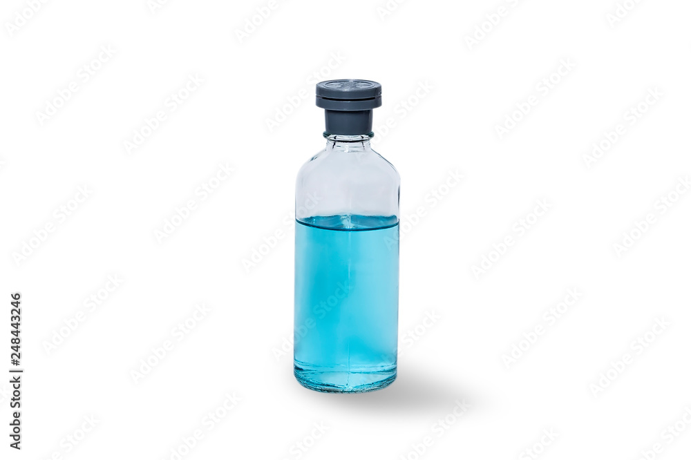 Glass jar with blue cosmetic liquid isolated on white. Bottle of nail polish remover. Glass jar with blue cosmetic liquid isolated on white. Bottle of nail polish remover.