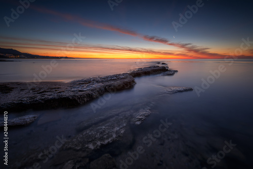 Sea sunrise at rocky beach © Jess_Ivanova
