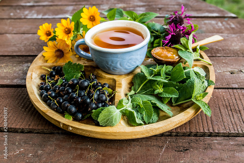cup tea herb echinacea mint chamomile berry plant blueberry flavor aroma jam apricot sweetness dessert tea drinking traditional useful menu menus wooden ingredients
