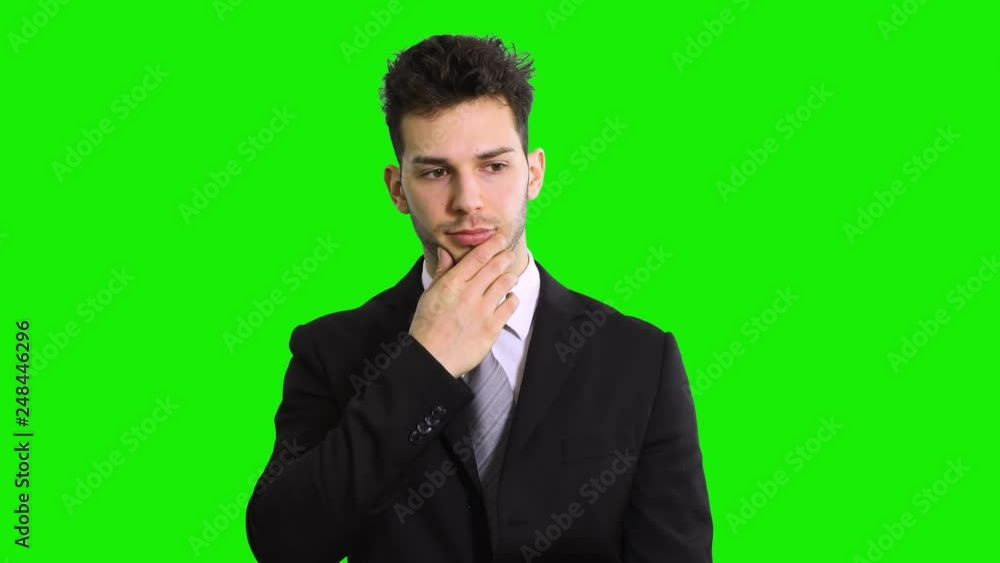 Thoughtful businessman isolated on green screen chroma key Thoughtful businessman isolated on green screen chroma key