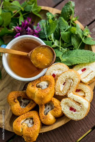 Mint grass herb tea jam jam apricot spoon wooden dessert tea drinking useful traditional cup blue