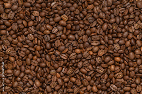 Coffee Beans Background. Roasted coffee beans close up.