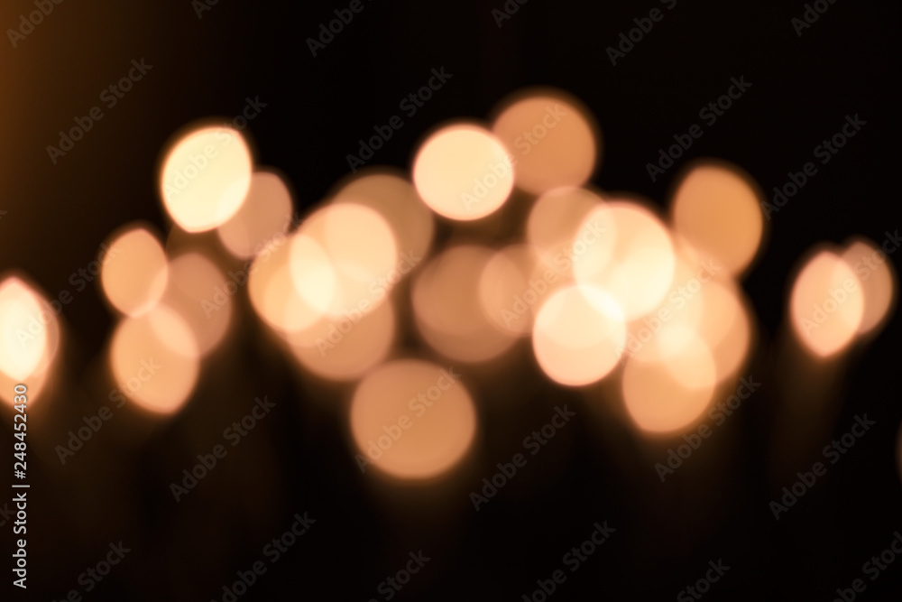 Fototapeta premium Yellow abstract bokeh background. Blur light bokeh
