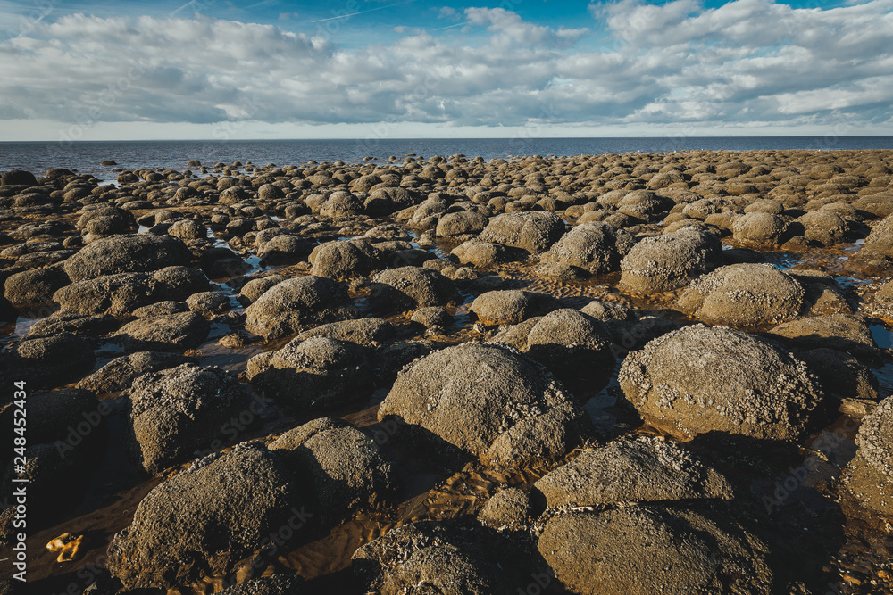 Round rocks in beach of Hunstanton, Norfolk Engalnd Round rocks in beach of Hunstanton, Norfolk Engalnd