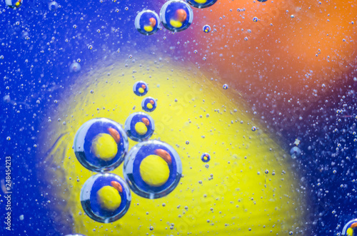 Bubbles over colored background. Cosmic color image.