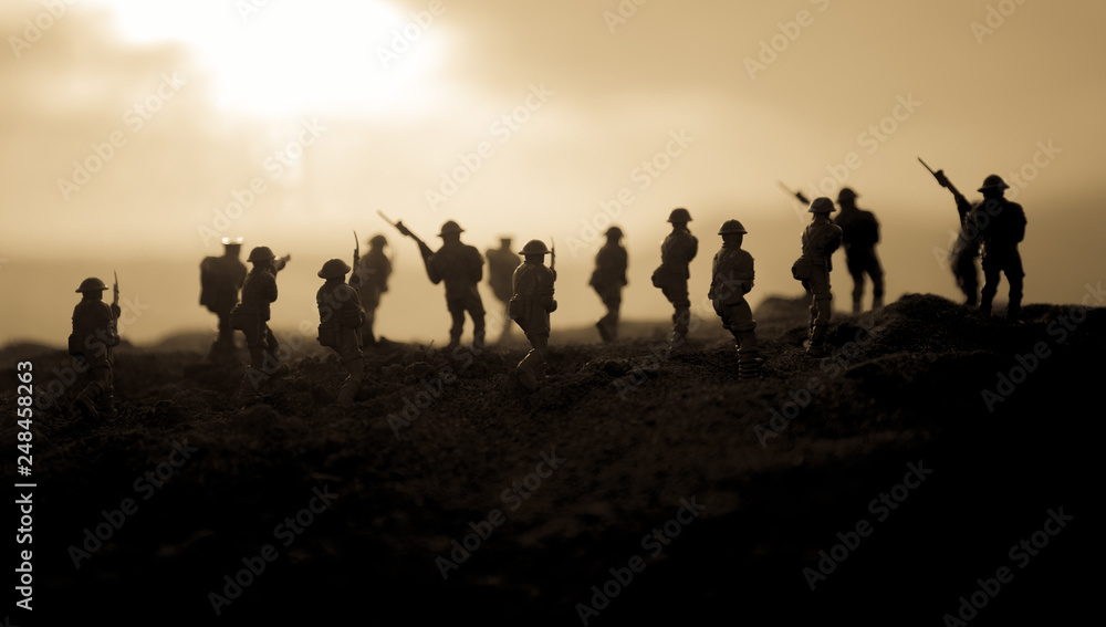 War Concept. Military silhouettes fighting scene on war fog sky background, World War Soldiers Silhouettes Below Cloudy Skyline At night. Attack scene. Armored vehicles. Tanks battle. Decoration