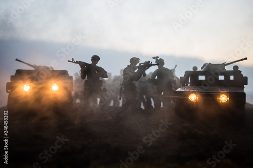Tableau sur toile Military patrol car on sunset background