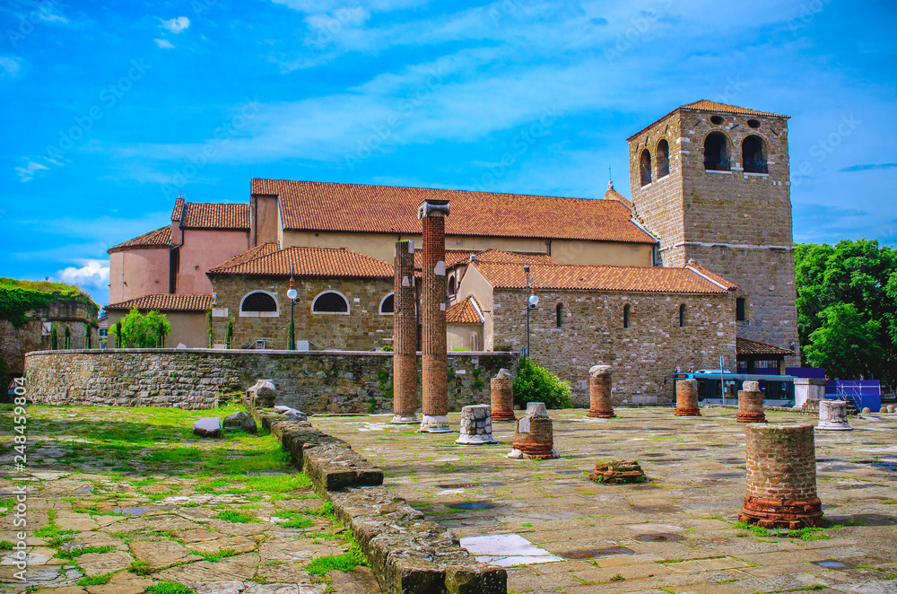 Obraz premium San Giusto Cathedral and Roman Forum hill in Trieste - Italy