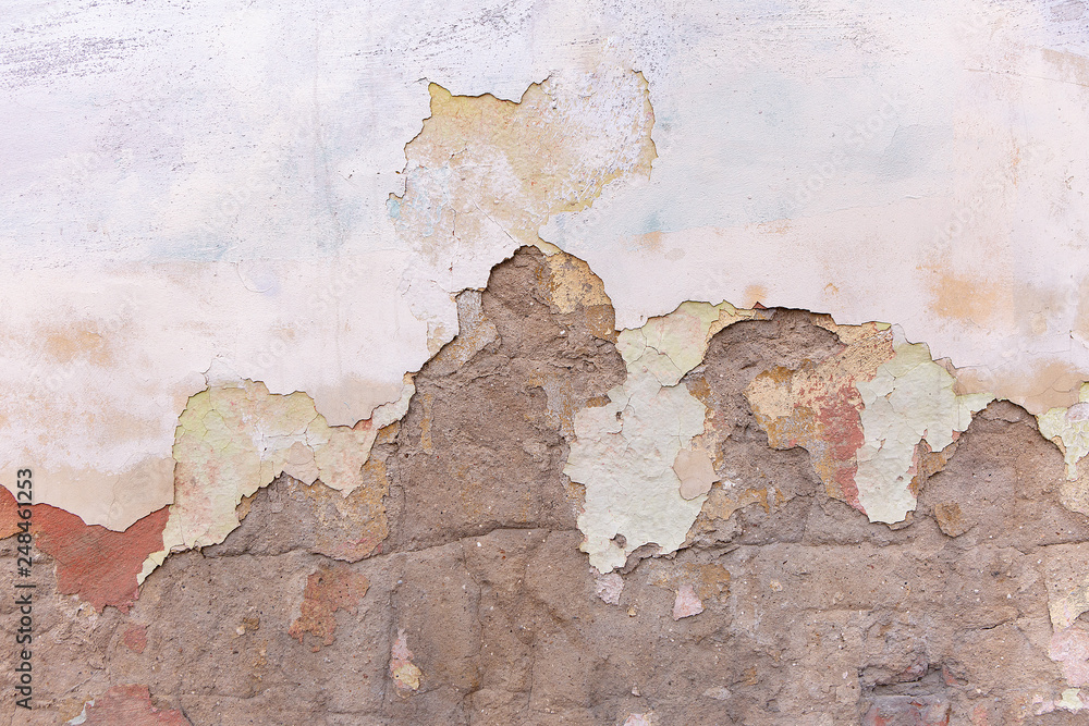 Fragment Of Surface Of Old Cement Wall With Remains Of Peeling Paint And Plaster.