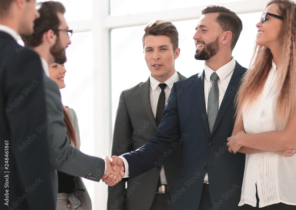 business partners meet in the business center business partners meet in the business center