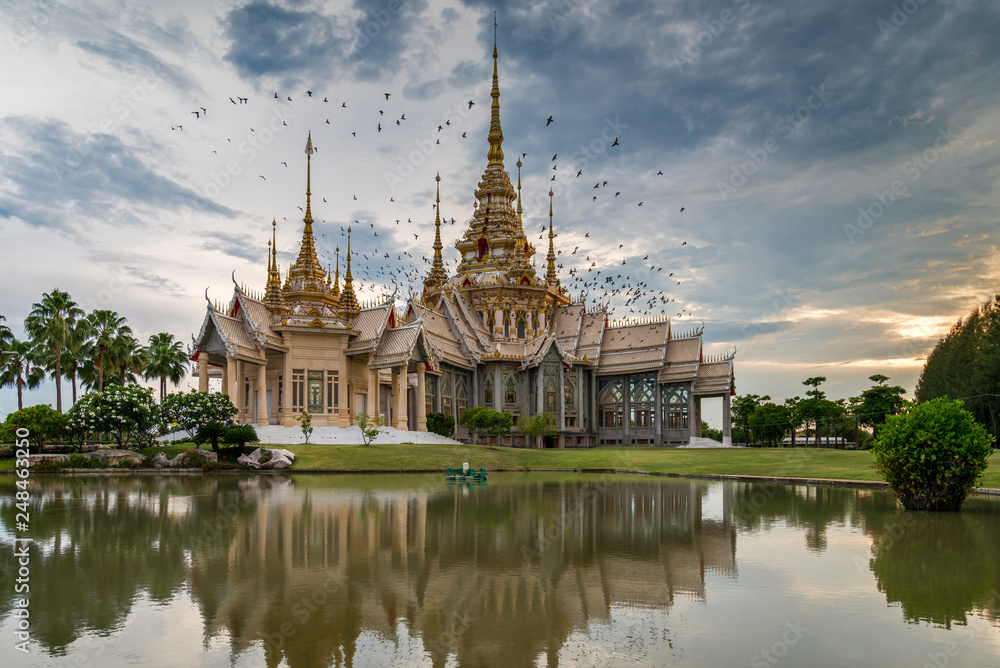 Birds circling above William Temple Wat Non Kum Thailand .