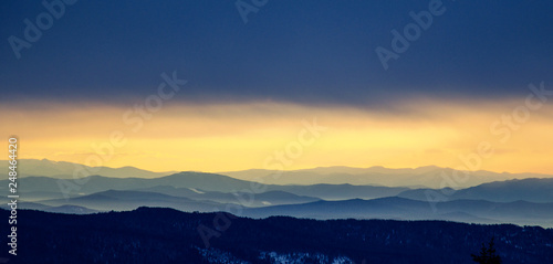 Panorama of mountain peaks in Sheregesh at dawn from Mount Zelenaya. © Mikhail