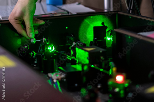 scientist work with laser machine or system b