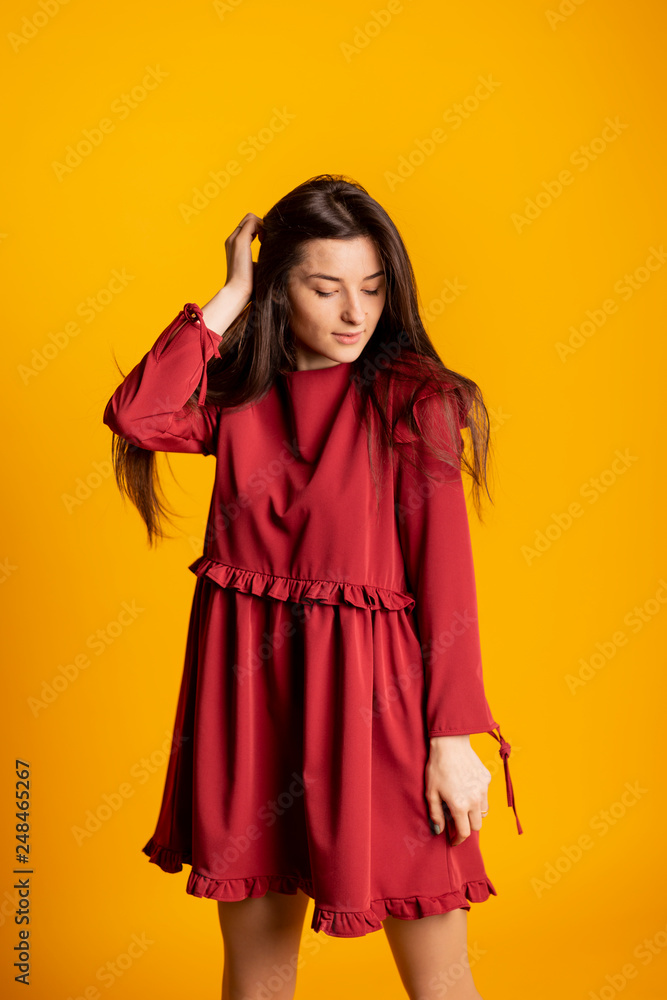 Pretty beautiful sexy elegance woman fashion model glamor pose wear red color silk gown. clothes for party summer collection makeup hair style brunette Pretty beautiful sexy elegance woman fashion model glamor pose wear red color silk gown. clothes for party summer collection makeup hair style brunette