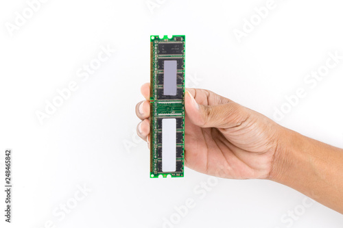 Hand holding IC chip Computer RAM isolated on white © Aniroot