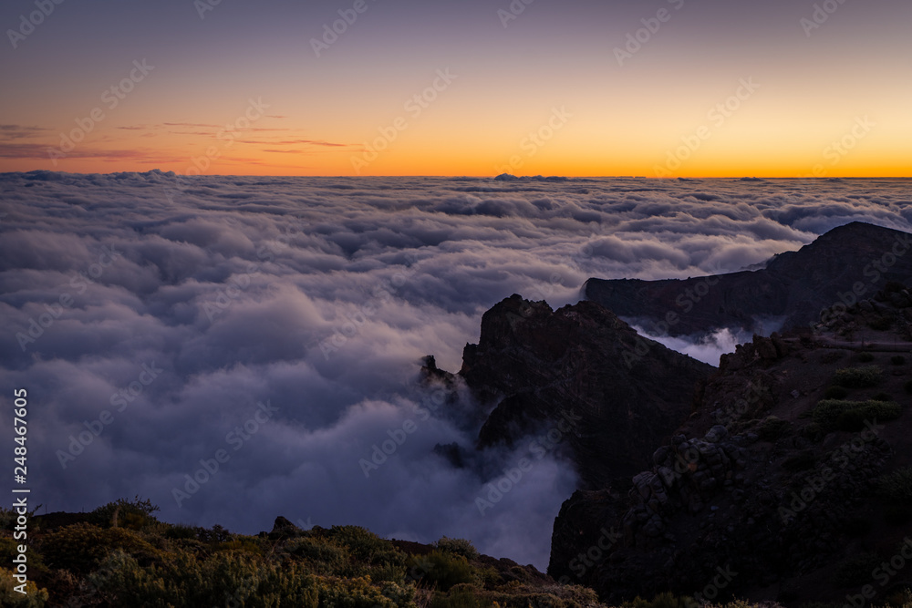 Above the clouds during sunset