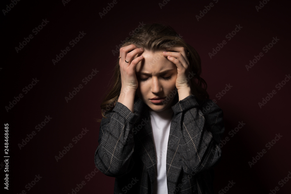 Health And Pain. Stressed Exhausted Young Woman Having Strong Tension Headache. Closeup Portrait Sick Girl Suffering From Head Migraine, Feeling Pressure And Stress. Health And Pain. Stressed Exhausted Young Woman Having Strong Tension Headache. Closeup Portrait Sick Girl Suffering From Head Migraine, Feeling Pressure And Stress.