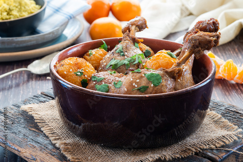 Duck tagine with clementines and citrus couscous