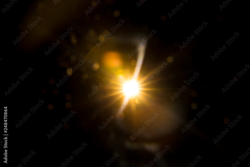 Abstract Natural Sun flare on the black background. Abstract Natural Sun flare on the black background.
