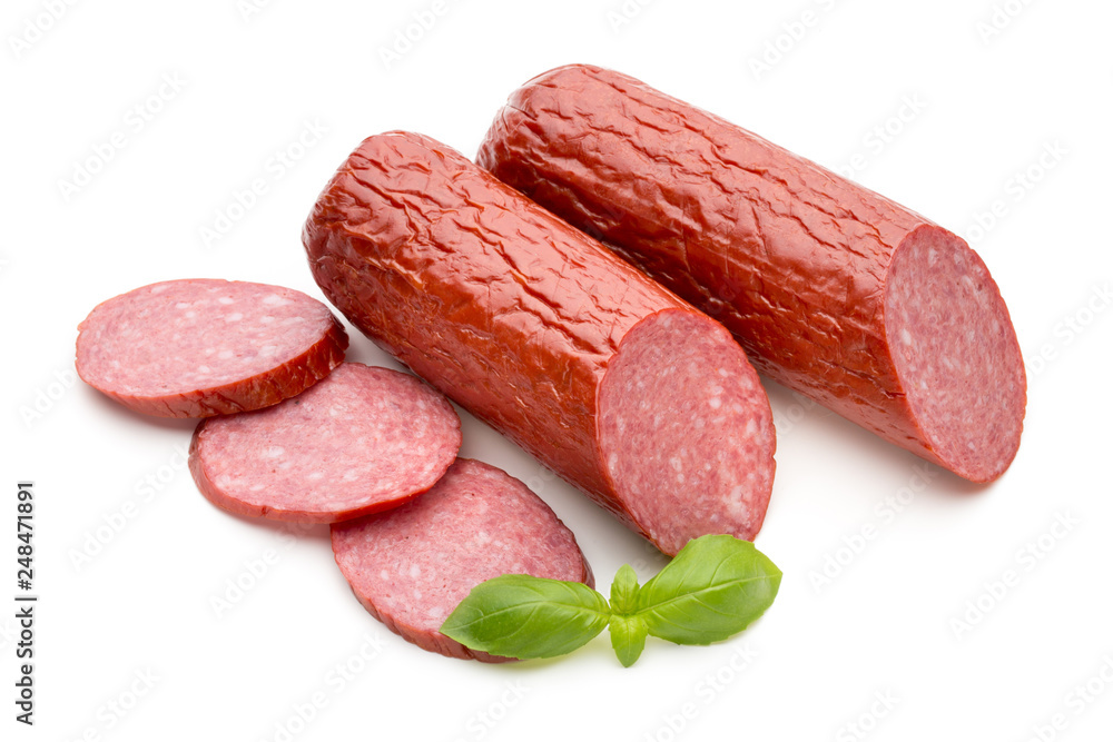 Salami smoked sausage, basil leaves on white background cutout. Salami smoked sausage, basil leaves on white background cutout.