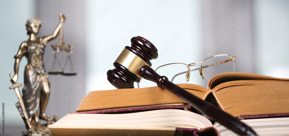 Law concept, sculpture and gavel   - obrazy, fototapety, plakaty 