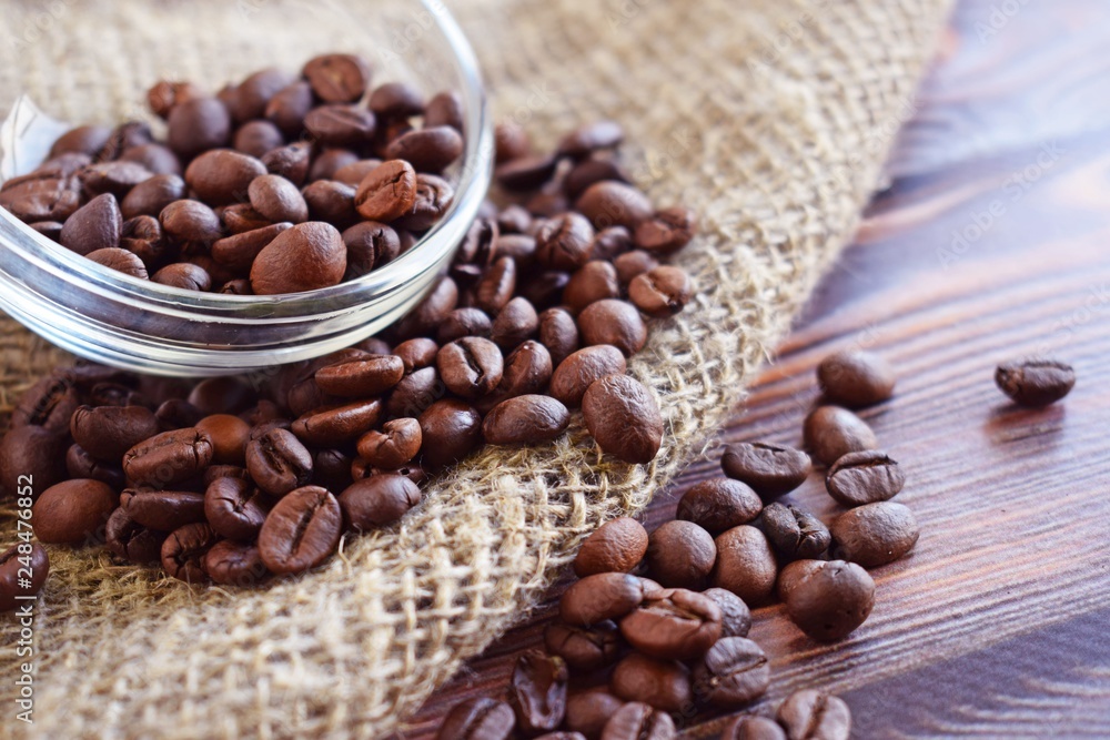 Coffee beans on the burlap.Flavored drink. Coffee beans on the burlap.Flavored drink.