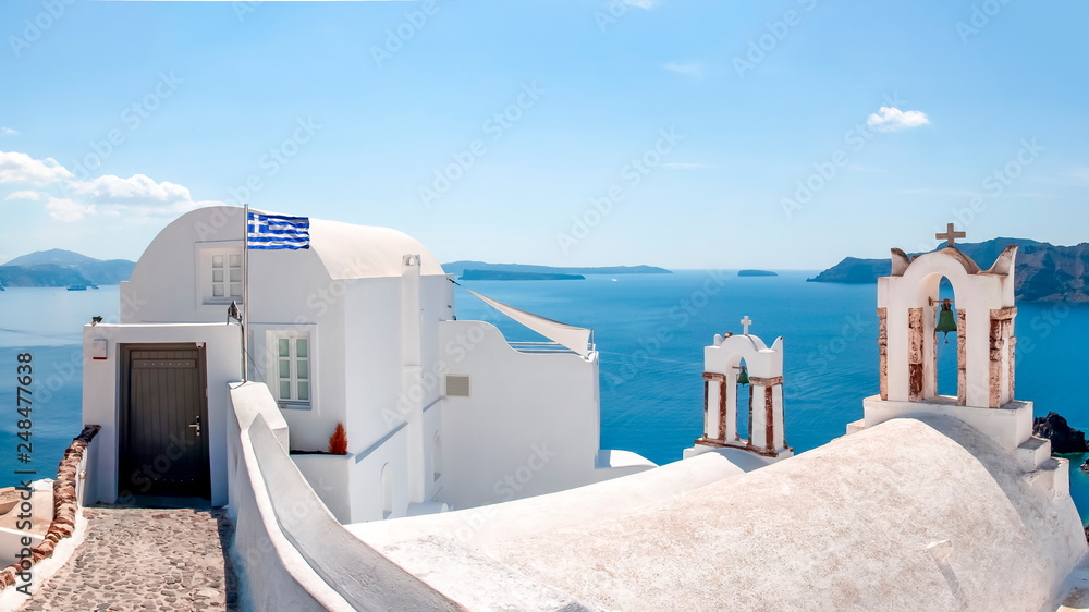 Fototapeta premium Traditional church in Oia village, Santorini island, Greece