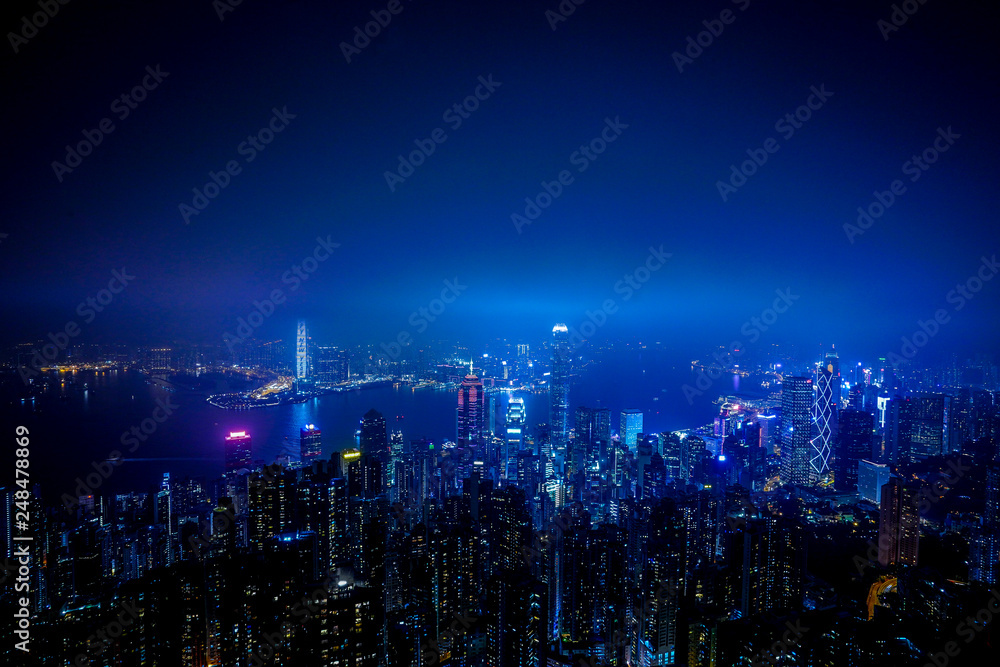 Fototapeta premium night city scape of Hongkong aerial view,high and top view.