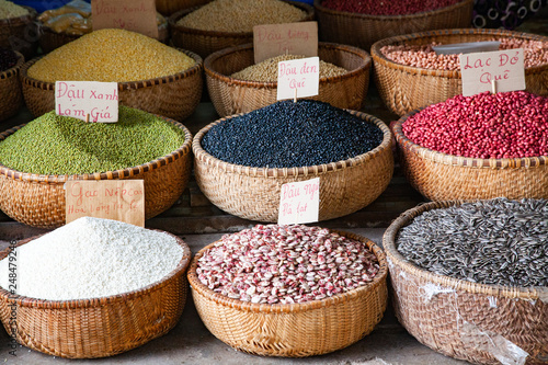 HANOI VIETNAM - AUGUST 2017: Various type of cereal grains (seeds, rice, buckwheat, oats, lentils,chickpeas, beans) on sale at Dong Xuan market