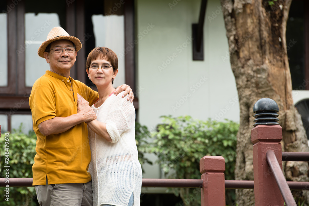 Fototapeta premium Image of happy romantic Asian senior couple outdoor in park