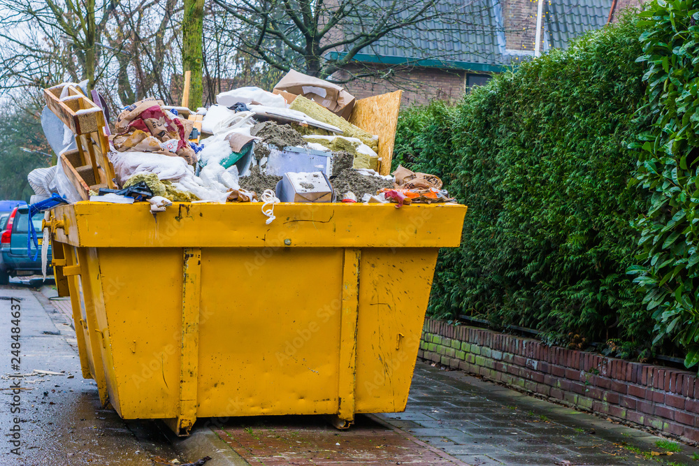 Ταπετσαρία massive container full of bulky waste, pile of garbage, recycling concept