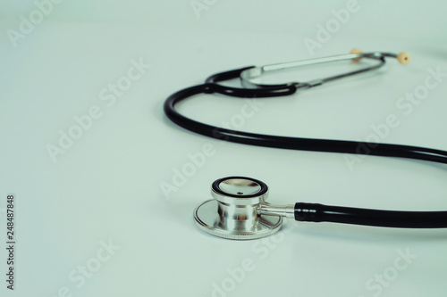 Stethoscope health tool on  table .Medical accessories with copy space.