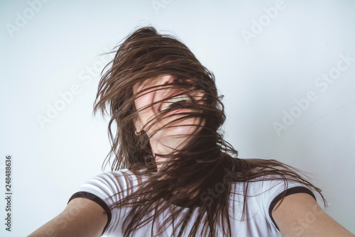 Close - up of beautiful woman taking selfie