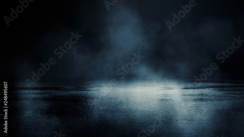 Background scene of empty street. Night view of the river, the night sky with clouds, the reflection of light on the water. Smoke fog