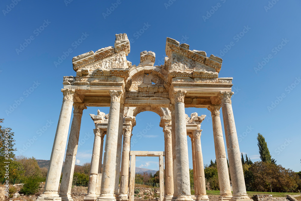 The Tetrapylon (monumental gate) at an archaeological site of Helenistic city of Aphrodisias in  western Anatolia, Turkey.