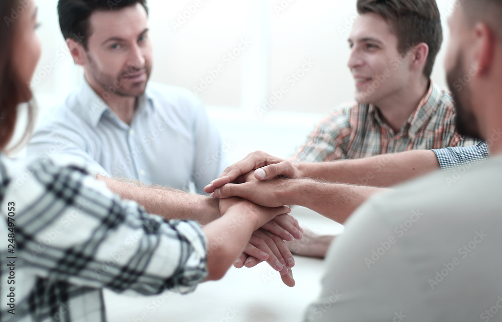Fototapeta premium close up.a successful business team put their hands together