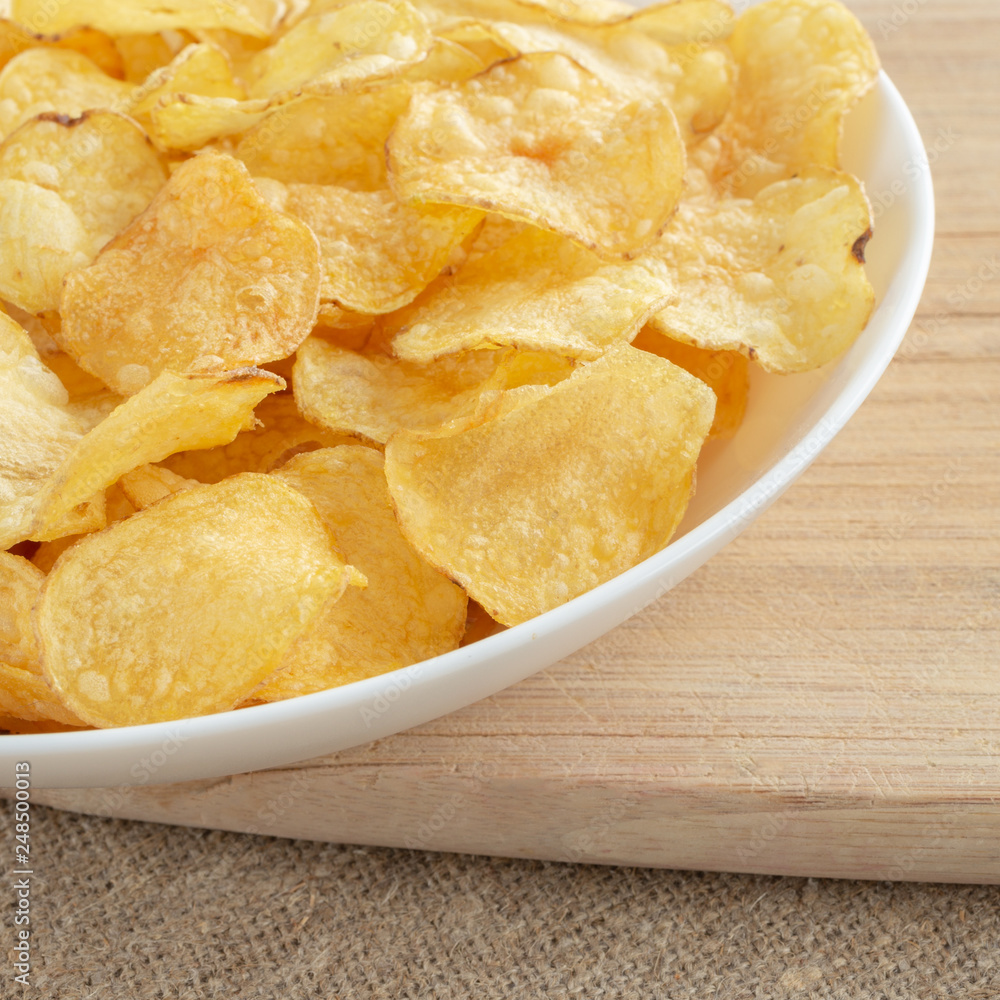Delicious potato chips with salt Delicious potato chips with salt