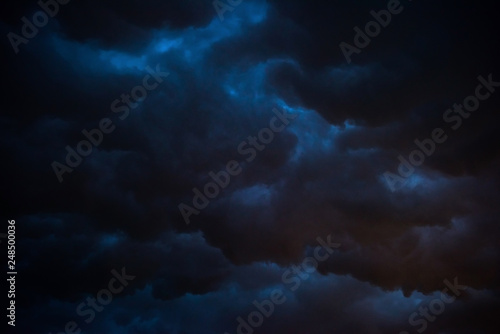 Fototapeta Naklejka Na Ścianę i Meble -  Black storm cloud at night, Dark sky and black clouds high contrast