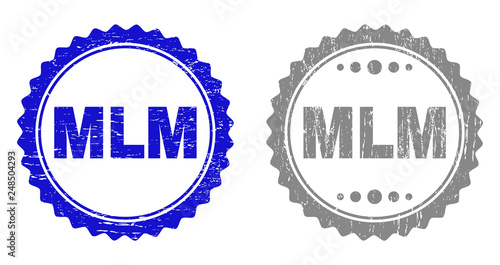 Grunge MLM stamp seals isolated on a white background. Rosette seals with grunge texture in blue and gray colors. Vector rubber stamp imitation of MLM text inside round rosette.